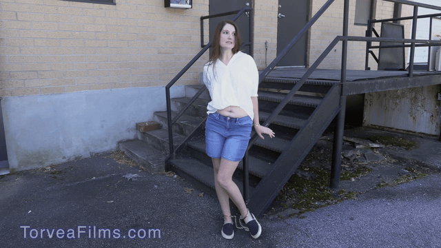 Paige Erin Turner in handcuffs and shackles.