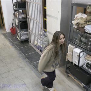 Woman hopping on one foot. Wearing only one shoe.